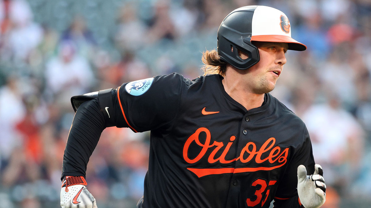 Baltimore Orioles catcher Adley Rutschman (35) hits a single during the fifth inning against the Detroit Tigers at Oriole Park at Camden Yards.