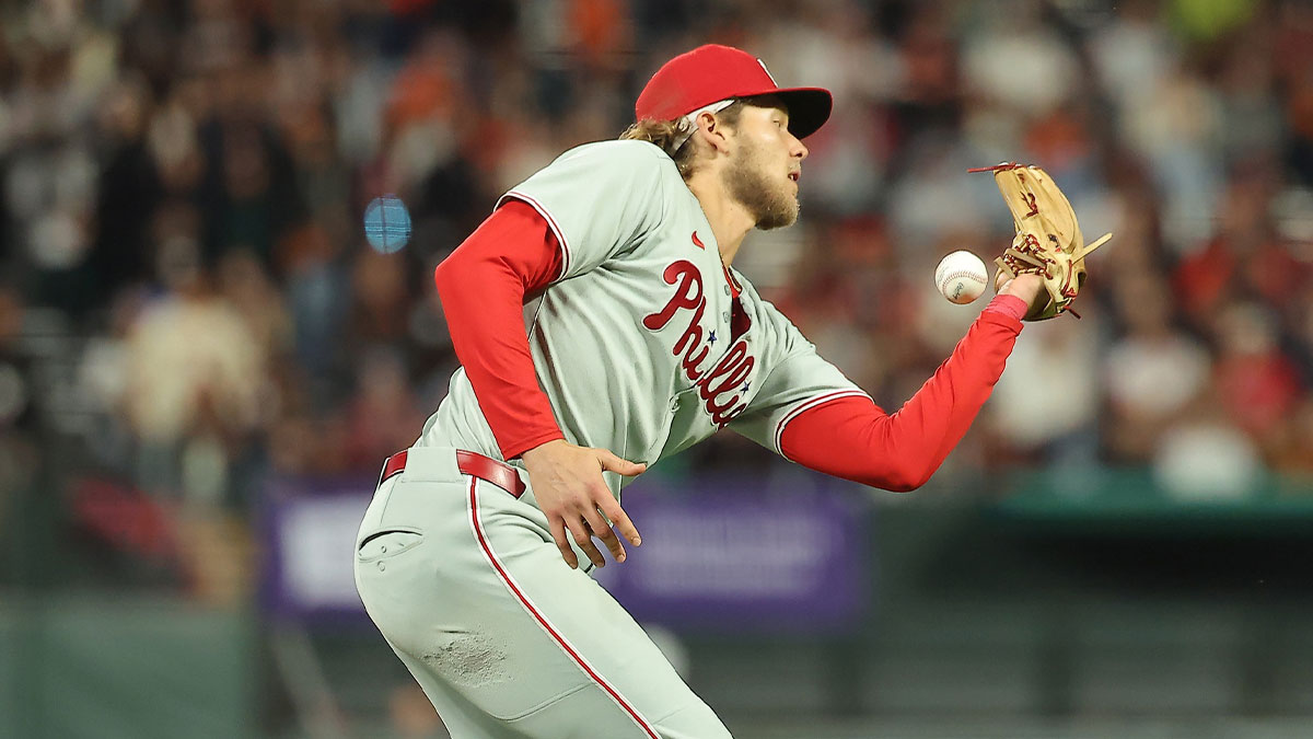 Philadelphia Phillies third baseman Alec Bohm (28) bobbles the ball against the San Francisco Giants during the ninth inning at Oracle Park.