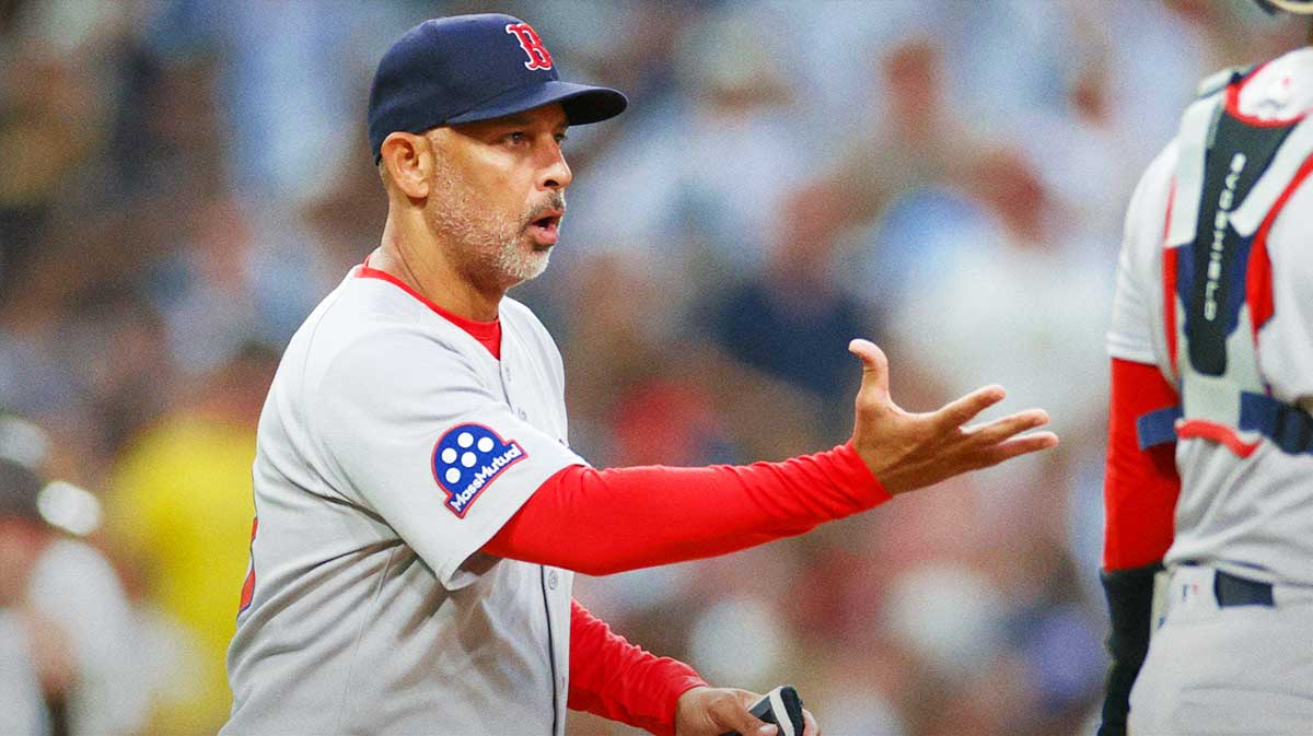 Boston Red Sox manager Alex Cora (13) makes a pitching change during the fifth inning against the San Diego Padres at Petco Park.