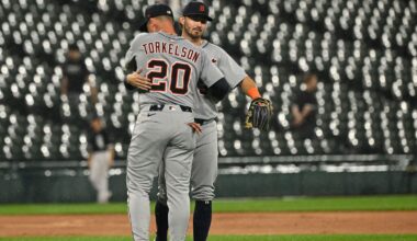 Detroit Tigers first base Spencer Torkelson (20) hugs third baseman  Zach McKinstry (39) after the game against the Chicago White Sox at Rate Field.