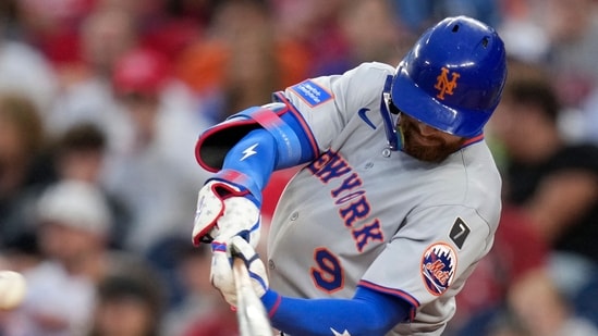 Brandon Nimmo of the New York Mets hits an RBI single against the Washington Nationals during at Nationals Park on August 19.(Getty Images via AFP)