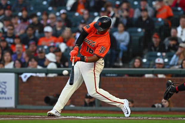 San Francisco Giants' Rafael Devers (16) connects for a solo home run in the first inning of their MLB game at Oracle Park in San Francisco, Calif., on Friday, Aug. 8, 2025. (Jose Carlos Fajardo/Bay Area News Group)