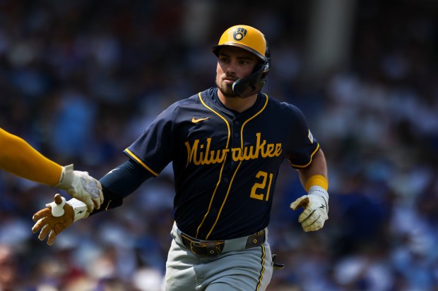 Milwaukee Brewers third base Caleb Durbin (21) celebrates after hitting a home run during the fifth inning against the Chicago Cubs at Wrigley Field on Monday, Aug. 18, 2025. (Eileen T. Meslar/Chicago Tribune)