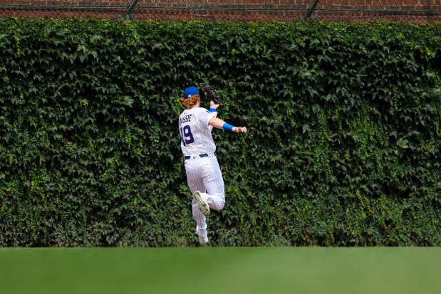 Chicago Cubs outfielder Owen Caissie (19) catches a long line drive during the second inning against the Milwaukee Brewers at Wrigley Field on Monday, Aug. 18, 2025. (Eileen T. Meslar/Chicago Tribune)