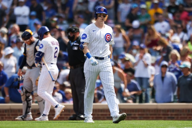 Chicago Cubs outfielder Owen Caissie (19) walks to the dugout after striking out during the fourth inning against the Milwaukee Brewers at Wrigley Field on Monday, Aug. 18, 2025. (Eileen T. Meslar/Chicago Tribune)