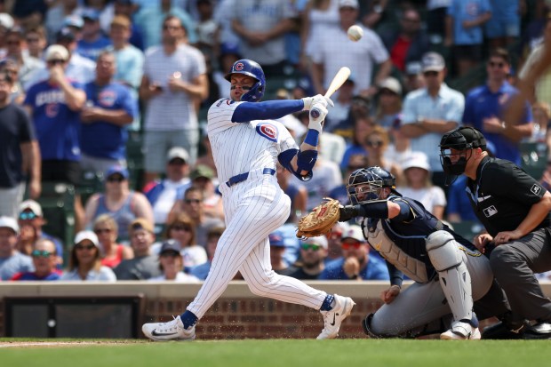 Chicago Cubs second base Nico Hoerner (2) hits a foul during the fourth inning against the Milwaukee Brewers at Wrigley Field on Monday, Aug. 18, 2025. (Eileen T. Meslar/Chicago Tribune)