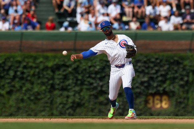 Chicago Cubs outfielder Willi Castro (1) throws to first base after fielding the ball during the sixth inning against the Milwaukee Brewers at Wrigley Field on Monday, Aug. 18, 2025. (Eileen T. Meslar/Chicago Tribune)