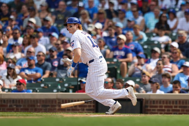 Chicago Cubs outfielder Owen Caissie (19) hits a single during the seventh inning against the Milwaukee Brewers at Wrigley Field on Monday, Aug. 18, 2025. (Eileen T. Meslar/Chicago Tribune)