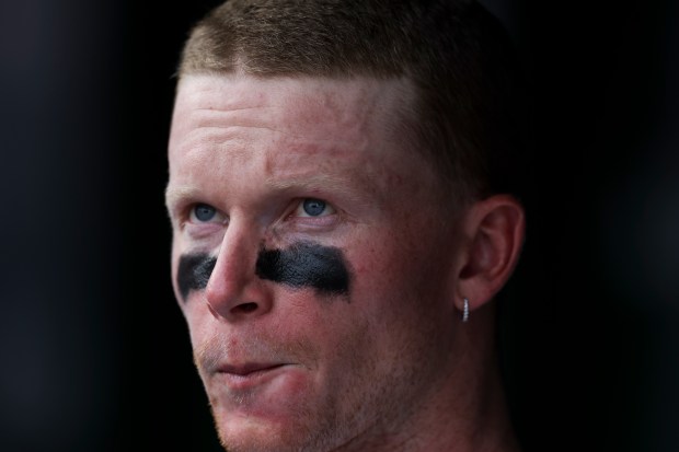 Chicago Cubs outfielder Pete Crow-Armstrong (4) stands in the dugout after the Cubs gave up four runs during the eighth inning against the Milwaukee Brewers at Wrigley Field on Monday, Aug. 18, 2025. (Eileen T. Meslar/Chicago Tribune)