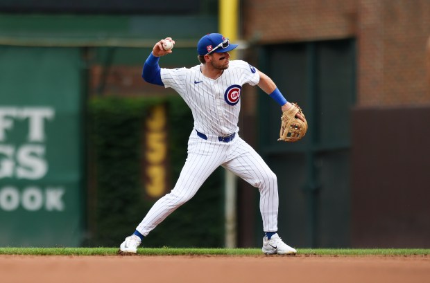 Chicago Cubs second base Nico Hoerner (2) throws to first base after fielding the ball during the first inning against the Pittsburgh Pirates at Wrigley Field on Sunday, Aug. 17, 2025. (Eileen T. Meslar/Chicago Tribune)