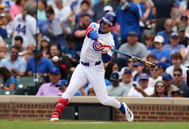 Chicago Cubs outfielder Pete Crow-Armstrong (4) hits a single during the second inning against the Pittsburgh Pirates at Wrigley Field on Sunday, Aug. 17, 2025. (Eileen T. Meslar/Chicago Tribune)
