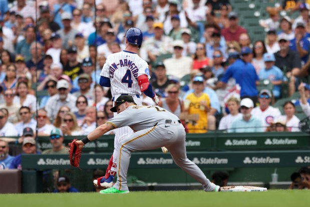 Chicago Cubs outfielder Pete Crow-Armstrong (4) safely beats the throw to first base in the second inning against the Pittsburgh Pirates at Wrigley Field on Sunday, Aug. 17, 2025. (Eileen T. Meslar/Chicago Tribune)