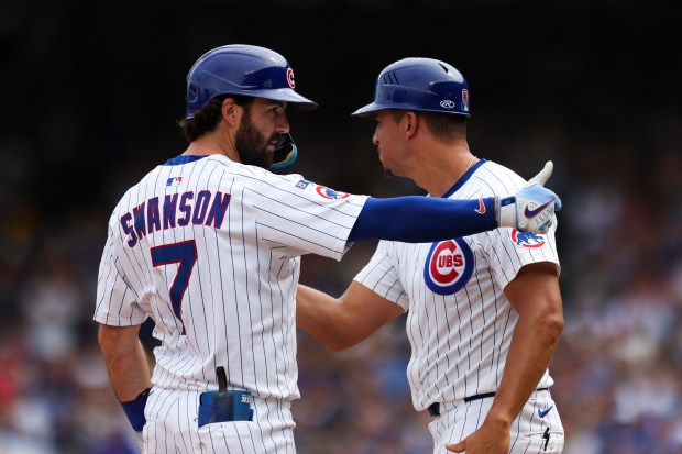 Chicago Cubs shortstop Dansby Swanson (7) gives a thumbs up after hitting an RBI double and getting to third base during the fifth inning against the Pittsburgh Pirates at Wrigley Field on Sunday, Aug. 17, 2025. (Eileen T. Meslar/Chicago Tribune)