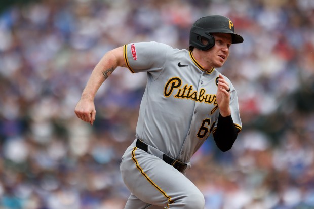 Pittsburgh Pirates outfielder Jack Suwinski (65) runs to third base during the sixth inning against the Chicago Cubs at Wrigley Field on Sunday, Aug. 17, 2025. (Eileen T. Meslar/Chicago Tribune)