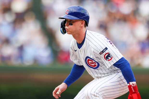 Chicago Cubs outfielder Pete Crow-Armstrong (4) leads off at first base during the eighth inning against the Pittsburgh Pirates at Wrigley Field on Sunday, Aug. 17, 2025. (Eileen T. Meslar/Chicago Tribune)