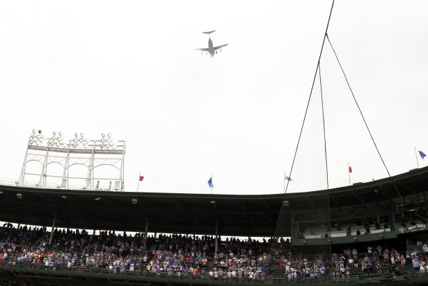 A plane flies over Wrigley Field before the Chicago Cubs game against the Pittsburgh Pirates on Sunday, Aug. 17, 2025. (Eileen T. Meslar/Chicago Tribune)