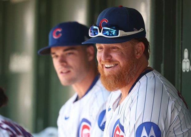 Chicago Cubs first baseman Justin Turner smiles in the dugout before facing the Cincinnati Reds on Wednesday, Aug. 6, 2025, at Wrigley Field. (Brian Cassella/Chicago Tribune)