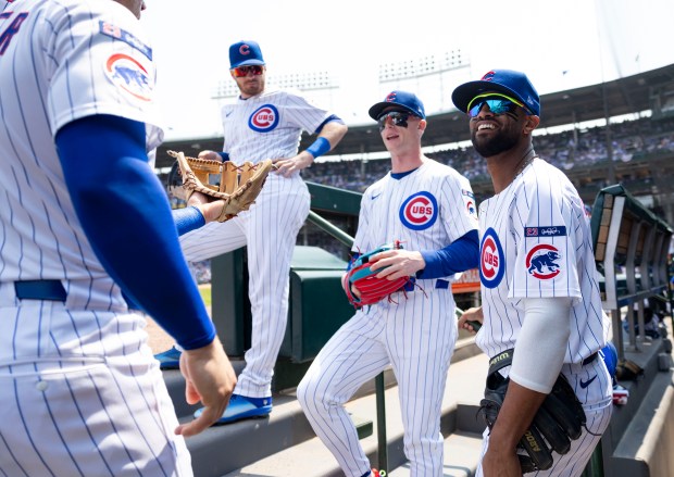 Chicago Cubs outfielder Willi Castro, right, and teammates prepare to face the Baltimore Orioles on Sunday, Aug. 3, 2025, at Wrigley Field. (Brian Cassella/Chicago Tribune)