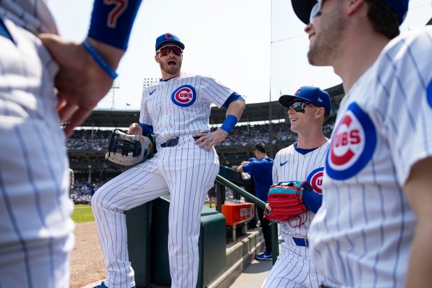 Chicago Cubs outfielders Ian Happ, Pete Crow-Armstrong and teammates prepare to face the Baltimore Orioles on Sunday, Aug. 3, 2025, at Wrigley Field. (Brian Cassella/Chicago Tribune)