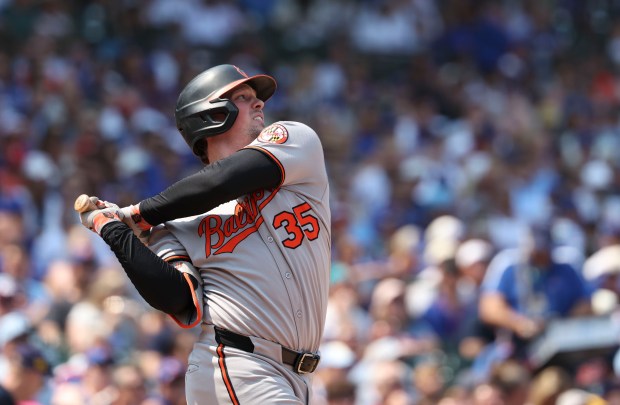 Baltimore Orioles catcher Adley Rutschman doubles in the fourth inning against the Chicago Cubs on Sunday, Aug. 3, 2025, at Wrigley Field. (Brian Cassella/Chicago Tribune)