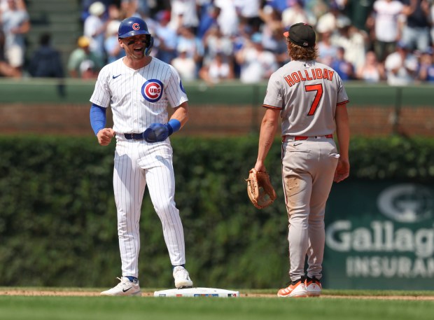Chicago Cubs second base Nico Hoerner celebrates an RBI single by Dansby Swanson to take the lead against the Baltimore Orioles in the sixth inning Sunday, Aug. 3, 2025, at Wrigley Field. (Brian Cassella/Chicago Tribune)
