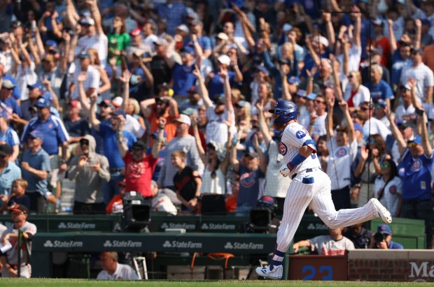 Chicago Cubs pinch hitter Justin Turner watches his walk-off home run leave the park to defeat the Baltimore Orioles, 5-3, on Sunday, Aug. 3, 2025, at Wrigley Field. (Brian Cassella/Chicago Tribune)