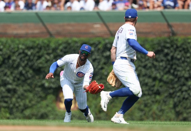 Cubs outfielder Willi Castro makes a sliding catch in the sixth inning Aug. 6, 2025, at Wrigley Field. (Brian Cassella/Chicago Tribune)