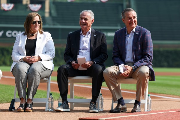 Chicago Cubs co-owner Laura Ricketts, from left, sits with MLB...