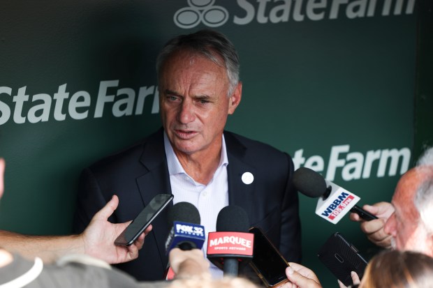 MLB Commissioner Rob Manfred answers questions at Wrigley Field on...