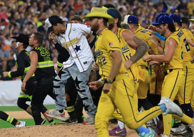 Chance the Rapper performs in the fifth inning of a game between the Savannah Bananas and Firefighters on Aug. 15, 2025, at Rate Field. (John J. Kim/Chicago Tribune)
