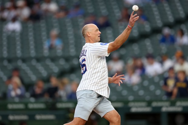 Chicago Blackhawks head coach Jeff Blashill throws out the first pitch before the Chicago Cubs play the Milwaukee Brewers at Wrigley Field on Wednesday, Aug. 20, 2025, in Chicago. (Armando L. Sanchez/Chicago Tribune)