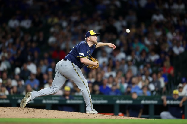 Milwaukee Brewers pitcher Jared Koenig (47) pitches during the eighth inning against the Chicago Cubs at Wrigley Field on Wednesday, Aug. 20, 2025, in Chicago. (Armando L. Sanchez/Chicago Tribune)