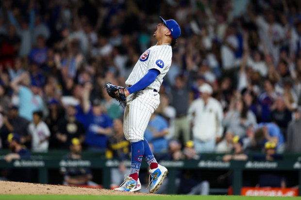 Chicago Cubs pitcher Daniel Palencia (48) celebrates after getting the last out to give the Cubs a 4-3 win over the Milwaukee Brewers at Wrigley Field on Wednesday, Aug. 20, 2025, in Chicago. (Armando L. Sanchez/Chicago Tribune)
