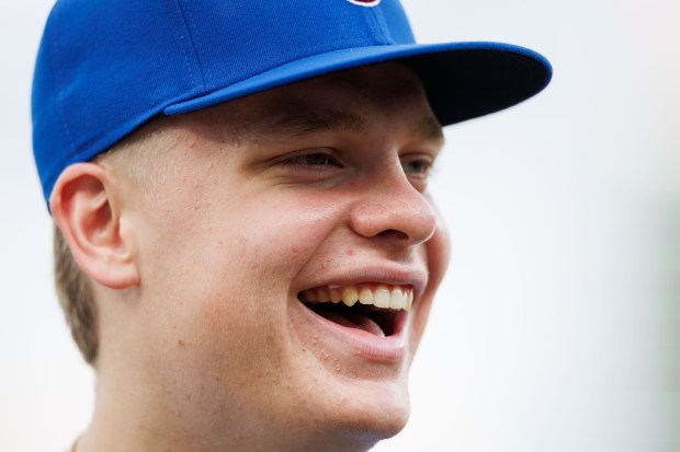 Outfielder Ethan Conrad, whom the Cubs selected at No. 17 in the 2025 MLB draft, walks on the field before the Cubs-Brewers game on Wednesday, Aug. 20, 2025, at Wrigley Field. (Armando L. Sanchez/Chicago Tribune)