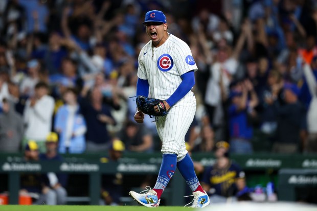 Chicago Cubs pitcher Daniel Palencia (48) celebrates after getting the last out to give the Cubs a 4-3 win over the Milwaukee Brewers at Wrigley Field on Wednesday, Aug. 20, 2025, in Chicago. (Armando L. Sanchez/Chicago Tribune)