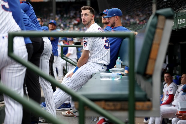 Chicago Cubs right fielder Kyle Tucker looks on from the dugout in the fifth inning while not staring in Game 1 of a doubleheader against the Milwaukee Brewers at Wrigley Field in Chicago on Aug. 19, 2025. (Chris Sweda/Chicago Tribune)