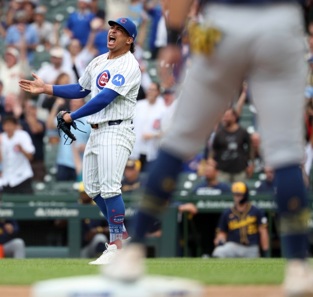 Chicago Cubs relief pitcher Daniel Palencia celebrates after securing a victory by shutting down the Milwaukee Brewers in the ninth inning of Game 1 of a doubleheader at Wrigley Field in Chicago on Aug. 19, 2025. (Chris Sweda/Chicago Tribune)