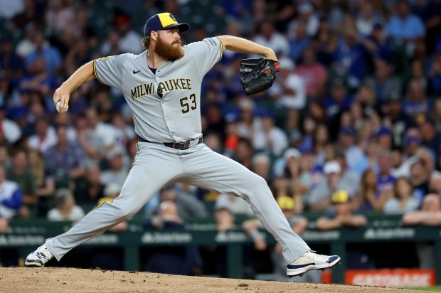 Milwaukee Brewers starting pitcher Brandon Woodruff (53) delivers to the Chicago Cubs in the first inning of Game 2 of a doubleheader at Wrigley Field in Chicago on Aug. 19, 2025. (Chris Sweda/Chicago Tribune)