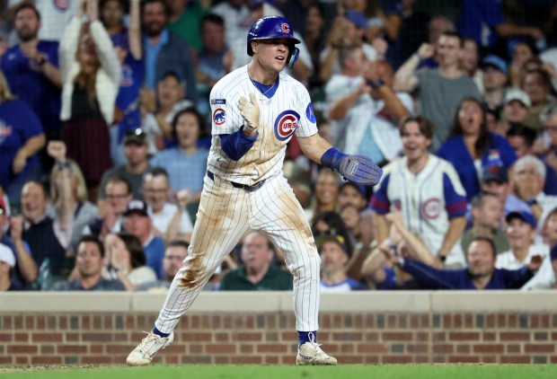 Chicago Cubs third baseman Matt Shaw celebrates after scoring in the sixth inning of Game 2 of a doubleheader against the Milwaukee Brewers at Wrigley Field in Chicago on Aug. 19, 2025. (Chris Sweda/Chicago Tribune)