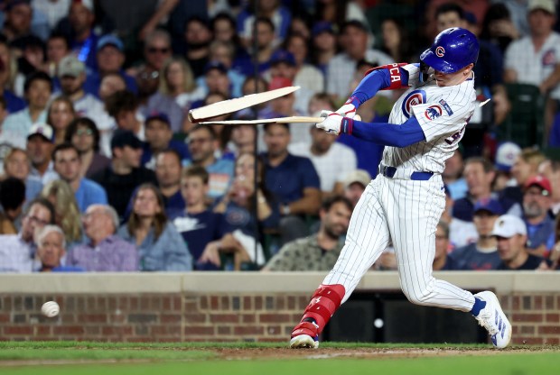 Chicago Cubs center fielder Pete Crow-Armstrong (4) breaks his bat as he grounds out in the seventh inning of Game 2 of a doubleheader against the Milwaukee Brewers at Wrigley Field in Chicago on Aug. 19, 2025. (Chris Sweda/Chicago Tribune)