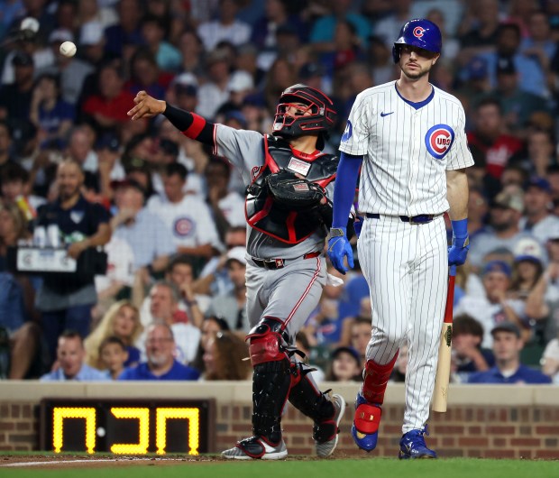 Chicago Cubs right fielder Kyle Tucker walks to the dugout after striking out in the fourth inning of a game against the Cincinnati Reds at Wrigley Field in Chicago on Aug. 5, 2025. (Chris Sweda/Chicago Tribune)
