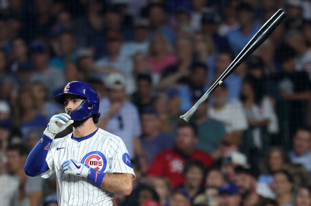 Chicago Cubs shortstop Dansby Swanson tosses his bat aside after striking out to end the fourth inning of a game against the Cincinnati Reds at Wrigley Field in Chicago on Aug. 5, 2025. (Chris Sweda/Chicago Tribune)