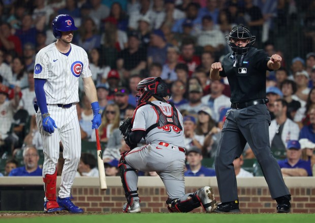 Chicago Cubs right fielder Kyle Tucker heads to the dugout after striking out to end the eighth inning of a game against the Cincinnati Reds at Wrigley Field in Chicago on Aug. 5, 2025. (Chris Sweda/Chicago Tribune)