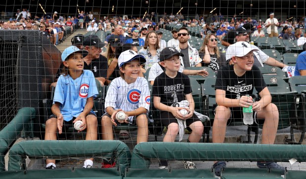 Young Cubs and White Sox fans take in the scene before the start of a City Series game July 26, 2025, at Rate Field. (Chris Sweda/Chicago Tribune)