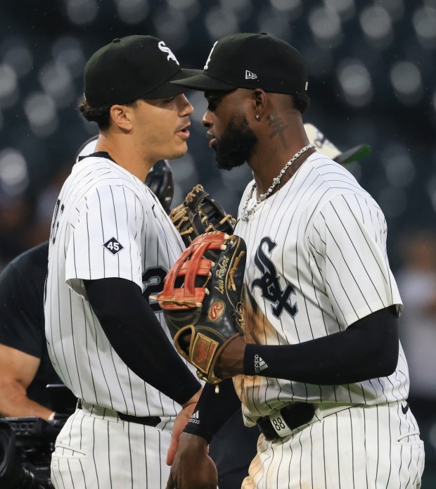 White Sox first baseman Miguel Vargas, left, and center fielder Luis Robert Jr. celebrate a 9-3 win over the Phillies on July 30, 2025, at Rate Field. (John J. Kim/Chicago Tribune)