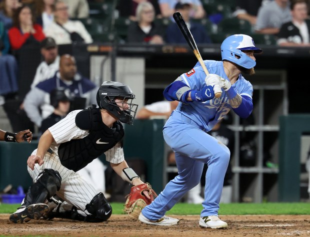 Kansas City Royals hitter Kyle Isbel drives in a run on a single in the ninth inning of a game against the Chicago White Sox at Rate Field in Chicago on Aug. 26, 2025. (Chris Sweda/Chicago Tribune)