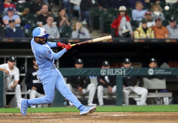 Kansas City Royals third baseman Maikel Garcia (11) drives in two runs on a single in the eighth inning of a game against the Chicago White Sox at Rate Field in Chicago on Aug. 26, 2025. (Chris Sweda/Chicago Tribune)