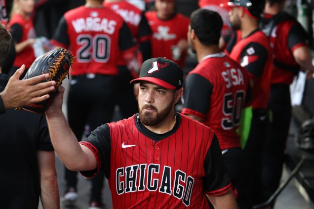 Chicago White Sox starting pitcher Aaron Civale is congratulated in the dugout after shutting down the Minnesota Twins in the second inning of a game at Rate Field in Chicago on Aug. 22, 2025. (Chris Sweda/Chicago Tribune)