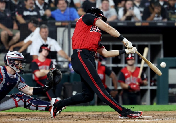 Chicago White Sox shortstop Colson Montgomery hits a two-run home run in the fifth inning of a game against the Minnesota Twins at Rate Field in Chicago on Aug. 22, 2025. (Chris Sweda/Chicago Tribune)