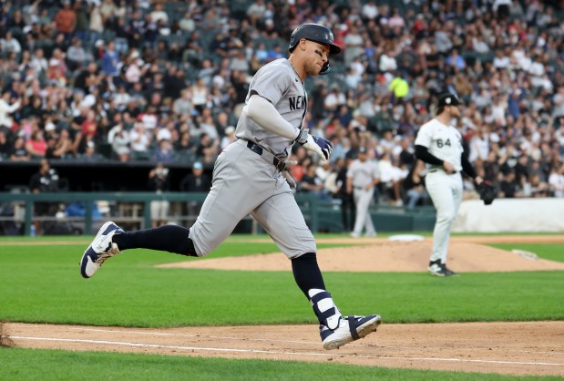 New York Yankees designated hitter Aaron Judge rounds the bases after hitting a solo home run in the fourth inning of a game against the Chicago White Sox at Rate Field in Chicago on Aug. 30, 2025. (Chris Sweda/Chicago Tribune)